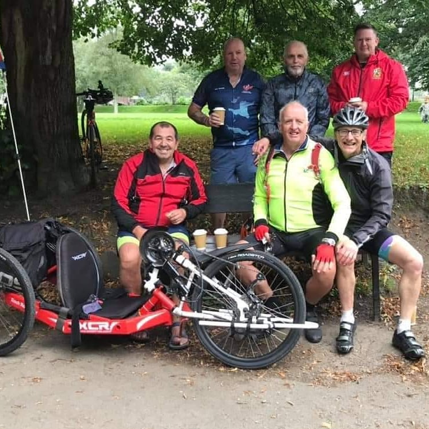 Dan Pengelly coaching veterans at Plymouth Sports Charity, supporting their physical fitness and well-being through cycling activities.